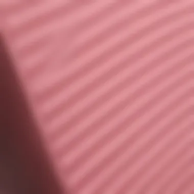 Close-up of pink adhesive shelf liner showcasing texture