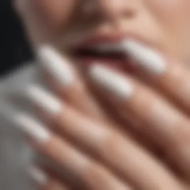 Close-up view highlighting the glossy finish of white long press on nails.