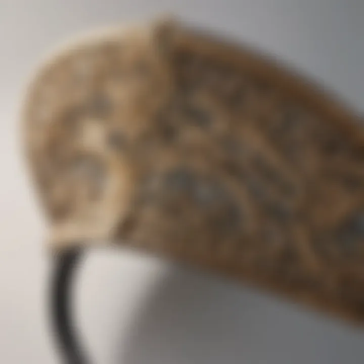 Close-up of intricate detailing on a designer visor holder