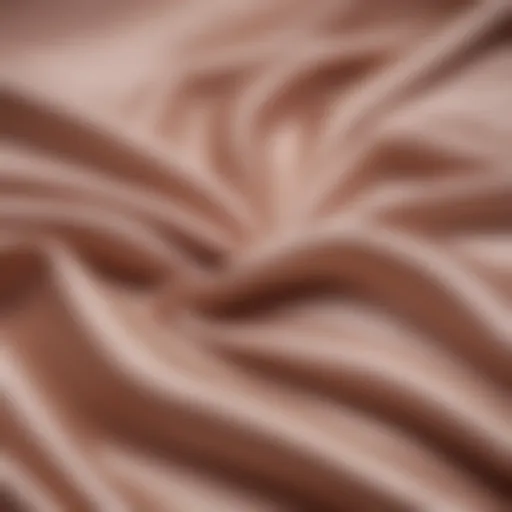 Close-up view of luxurious sheer satin fabric showcasing its smooth texture and sheen